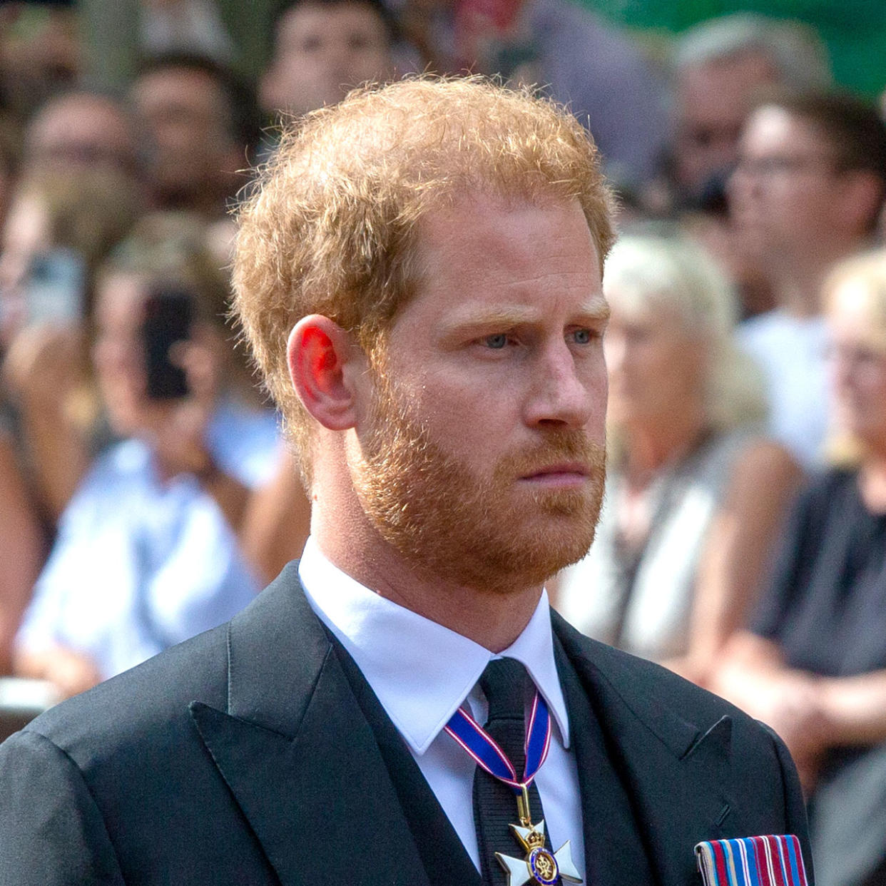Prince Harry follows Queen Elizabeth II's coffin