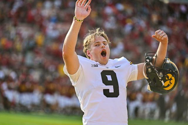 Iowa downs Wisconsin in a game with 18 punts for 849 yards - Yahoo Sports