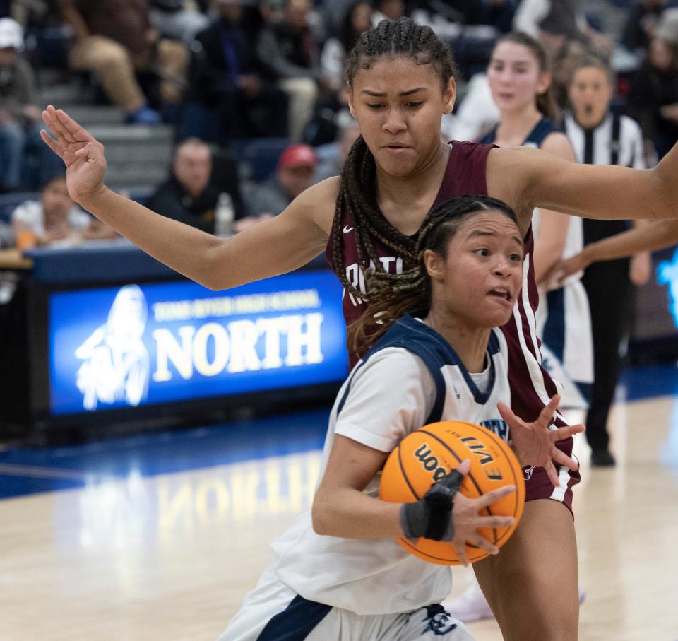 Morris Catholic Mya Pauldo drives past Rutgers Gigi Battle.  Morris Catholic defeats Rutgers Prep  in Non-Public Girls Championship in Toms River on March 5, 2023. 