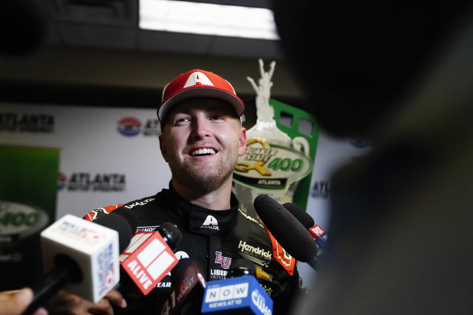 William Byron speaks to the media after winning a NASCAR Cup Series auto race at Atlanta Motor Speedway on Sunday, July 9, 2023, in Hampton, Ga. (AP Photo/Brynn Anderson)