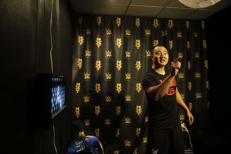 WWE wrestler Bin Wang of China practices his promotional videos at the WWE Performance Center in Azalea Park, Florida, December 1, 2016. REUTERS/Scott Audette