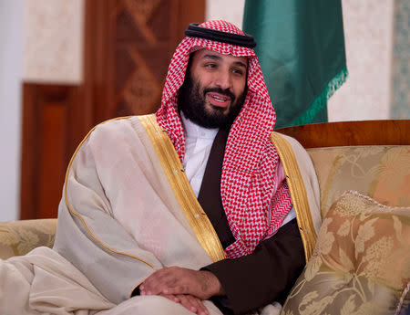 FILE PHOTO: Saudi Arabia's Crown Prince Mohammed bin Salman is pictured during his meeting with Algerian Prime Minister Ahmed Ouyahia and officials in Algiers, Algeria December 2, 2018. . Bandar Algaloud/Courtesy of Saudi Royal Court/Handout via REUTERS