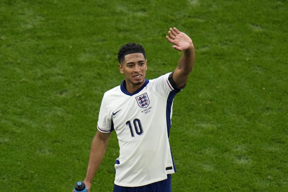 England's Jude Bellingham waves during a semifinal match between the Netherlands and England at the Euro 2024 soccer tournament in Dortmund, Germany, Wednesday, July 10, 2024. (AP Photo/Hassan Ammar)