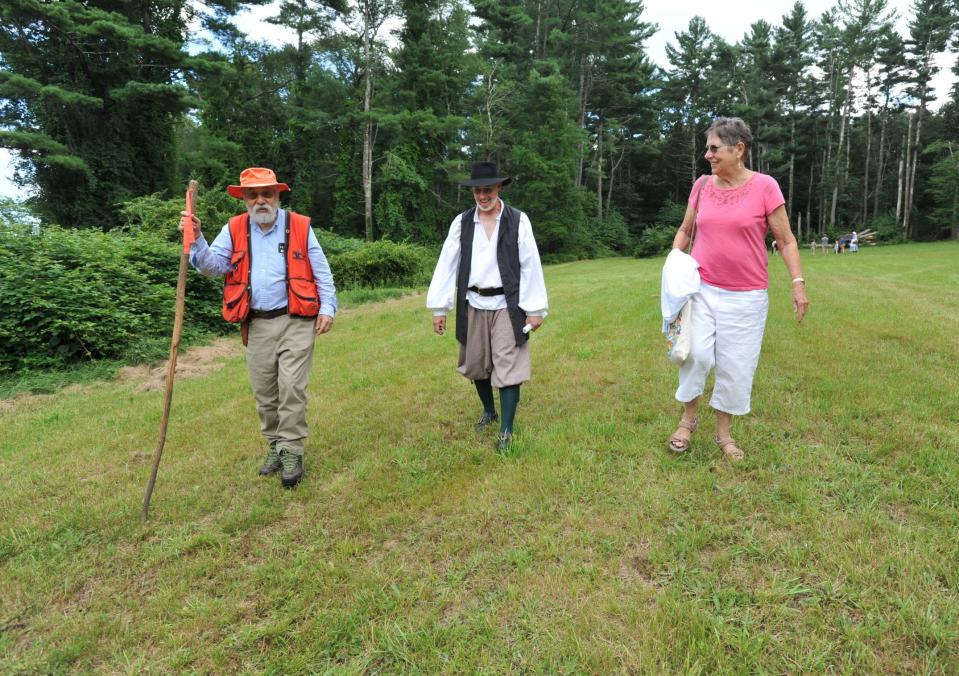 Elizabeth Ames, of New Jersey, right, is guided by Steve Ivas, left, of Norwell, and Jim Stetson, of Westboro, president of the Stetson Kindred of America. They are on the property where Norwell founder Cornet Robert Stetson settled in the 17th century. The Stetson Heritage Day was held Saturday, Aug. 19, 2023.