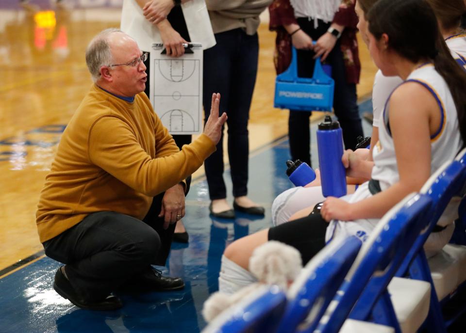 Frenship's head girls basketball coach Trent Hilliard talks to his team against Midland Legacy, Tuesday, Jan. 17, 2023, at the Tiger Pit in Wolfforth.