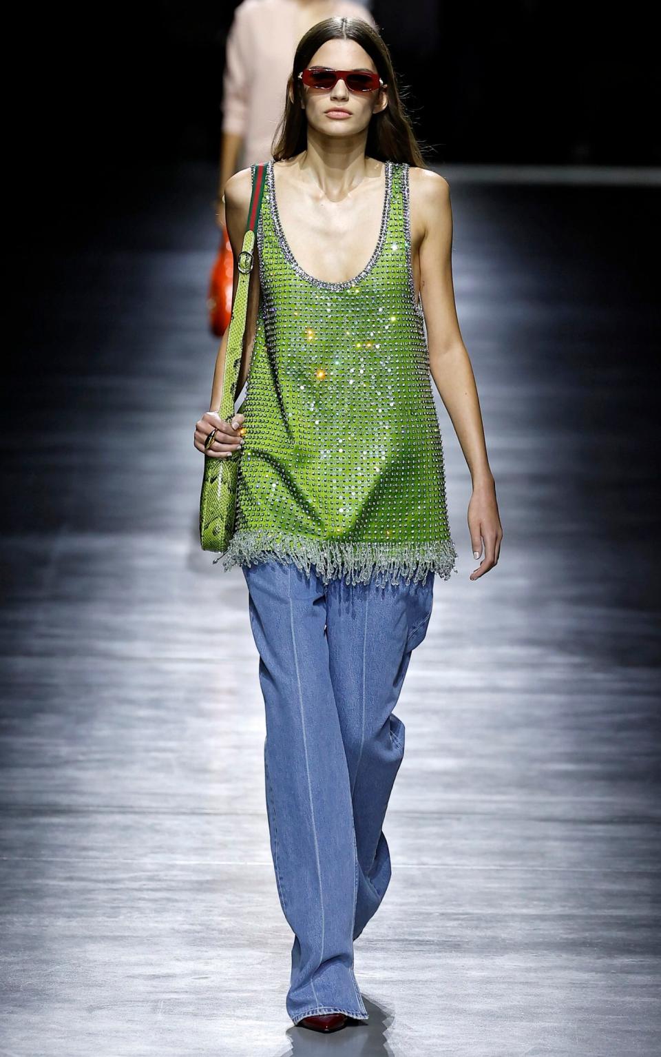 A Gucci model walks during the Milan Fashion Week in Spring 2023