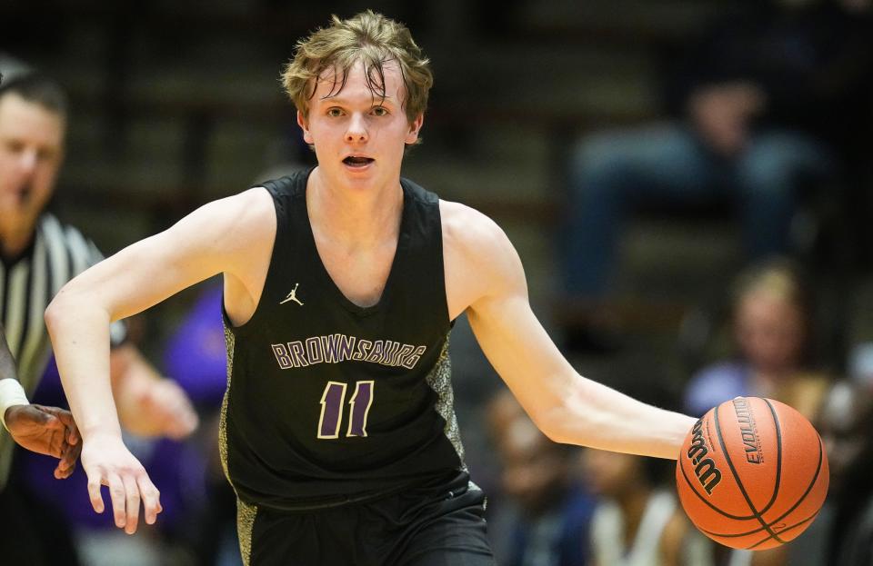 Brownsburg Bulldogs Grant Porath (11) rushes up the court during the game against the Ben Davis Giants on Saturday, March 18, 2023 at New Castle Fieldhouse in New Castle. The Ben Davis Giants defeated the Brownsburg Bulldogs, 66-38, for the IHSAA Class 4A Semistate championship game. 