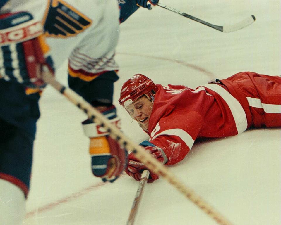 Kirk Maltby of the Red Wings goes for the puck during Game 6 of the first round of playoffs vs. the Blues April 27, 1997 at Kiel Center in St. Louis.