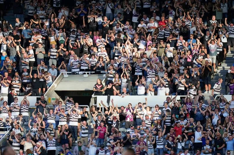 Hull FC fans celebrate after their sides win in the Derby
