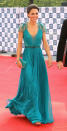 <div class="caption-credit"> Photo by: Getty</div>Teal is the color of the day! Kate wore this stunning Jenny Packham dress with Jimmy Choo sandals at a concert to celebrate the London 2012 Olympics. <br>