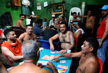 Prisoners play cards in Puerto Cortes jail, Honduras, July 31, 2018. REUTERS/Goran Tomasevic