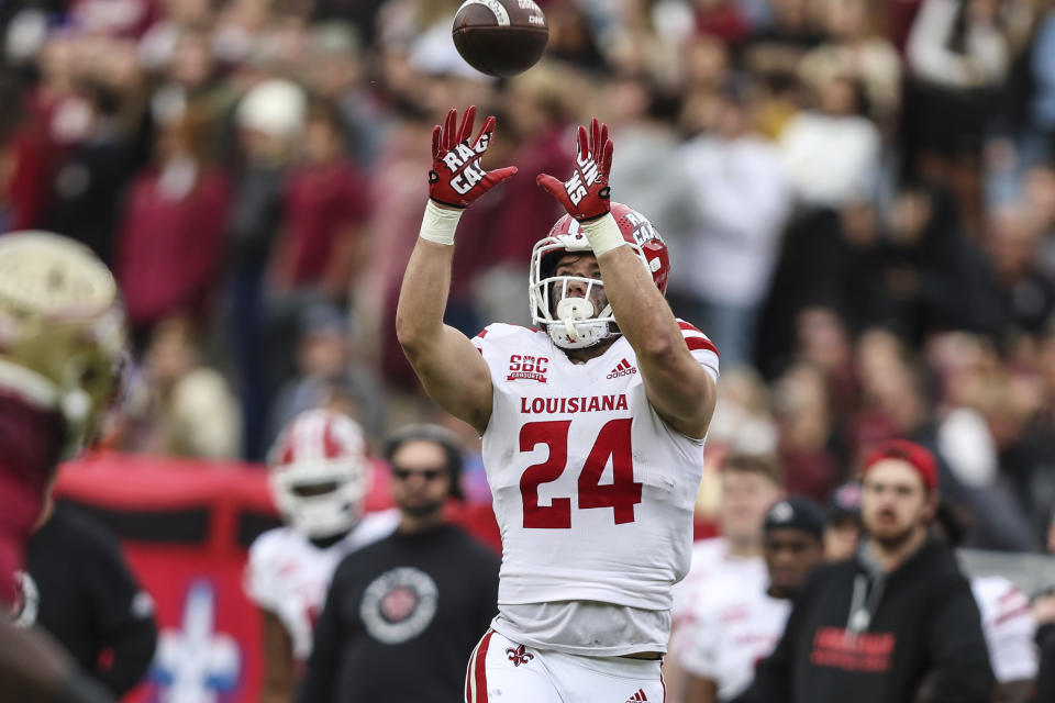 Louisiana tight end Pearse Migl (24) catches a pass during the first half of an NCAA college football game against Florida State on Saturday, Nov. 19, 2022, in Tallahassee, Fla. (AP Photo/Gary McCullough)