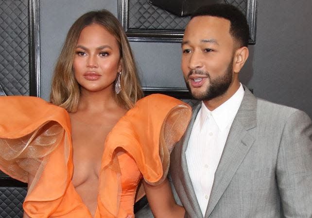 Chrissy Teigen and John Legend on the red carpet at the 62nd Annual Grammy Awards on January 26, 2020, at the Staples Center in Los Angeles