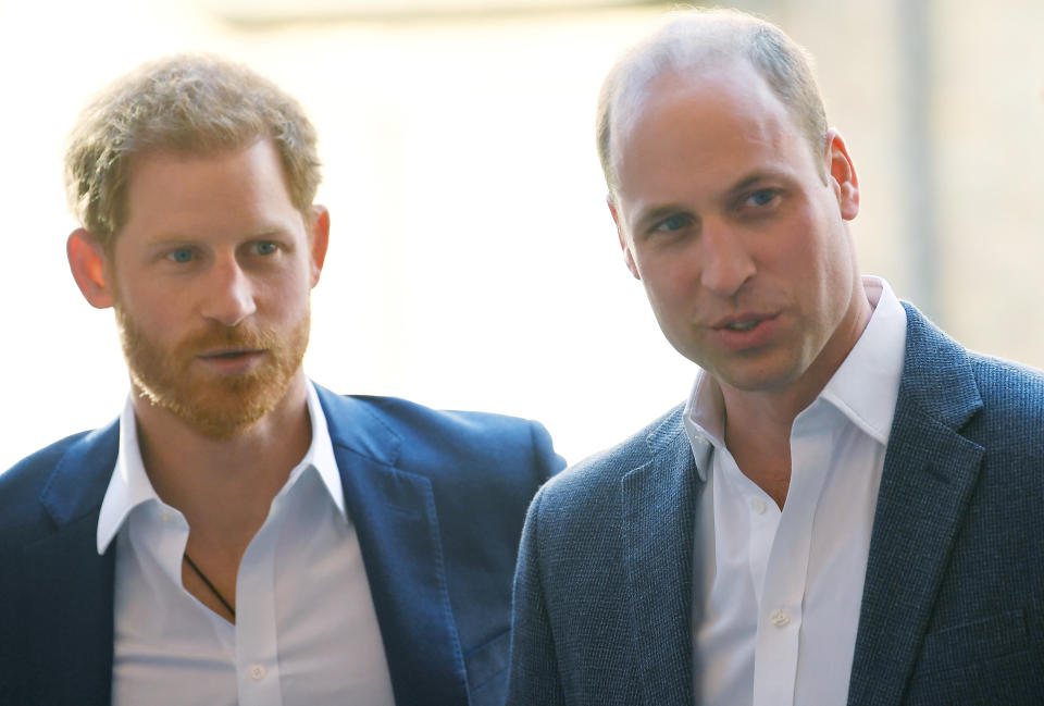 Prince William and Prince Harry probably staring at light switches they'd like to turn off. (Photo: Getty)