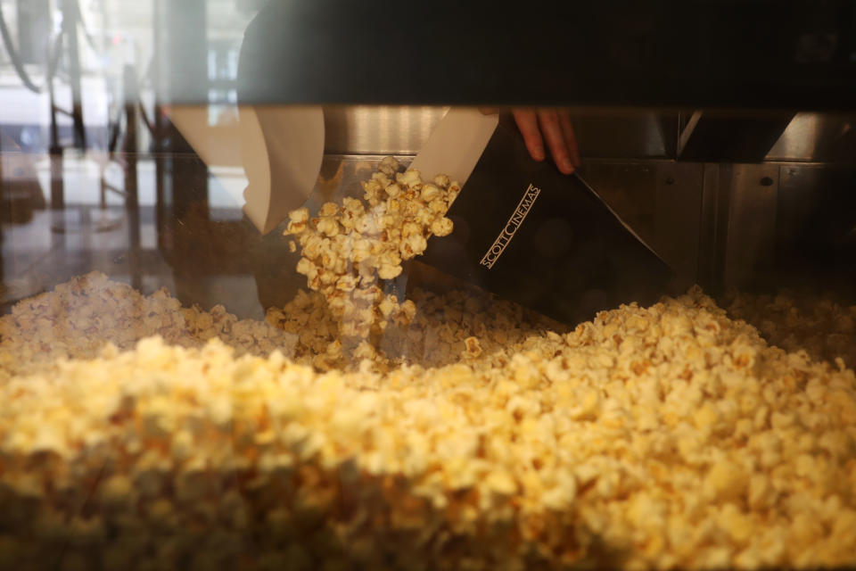 <p>TRURO, ENGLAND - MAY 17: Popcorn is served at The Plaza cinema on May 17, 2021 in Truro, England. England implements the third step in its road map out of Coronavirus lockdown today. The service industry can welcome customers inside premises to eat and drink, Fitness Classes can resume, holiday accommodation, Bingo halls, theatres, cinemas and indoor attractions will be able to welcome back customers and visitors. (Photo by Cameron Smith/Getty Images)</p>
