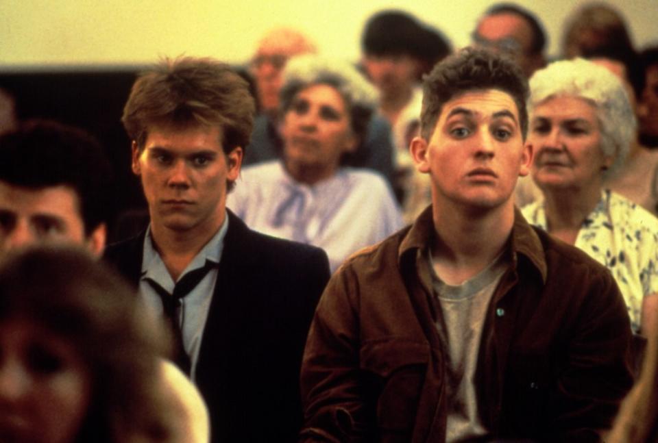 Kevin Bacon (left) and Chris Penn in a scene from “Footloose.” ©Paramount/Courtesy Everett Collection