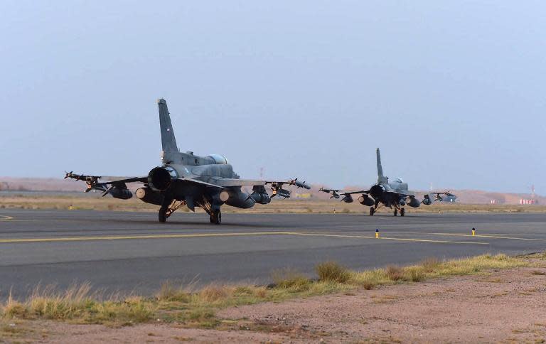 UAE fighter jets on the tarmac of a Saudi air force base after raids against Shiite Huthi rebels in Yemen