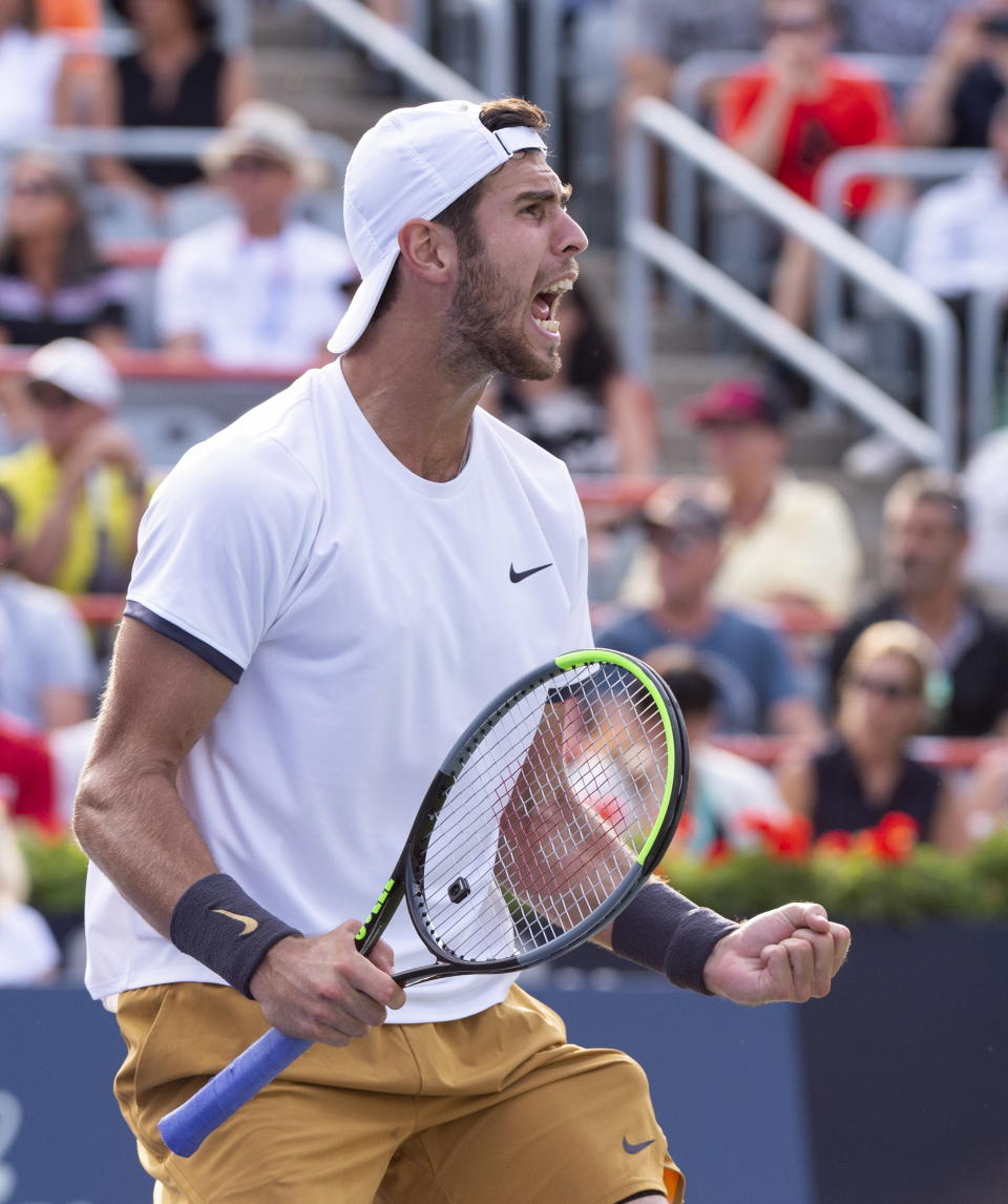 Karen Khachanov, of Russia, celebrates his victory over Felix Auger-Aliassime, of Canada, during the Rogers Cup men’s tennis tournament Thursday, Aug. 8, 2019, in Montreal. (Paul Chiasson/The Canadian Press via AP)