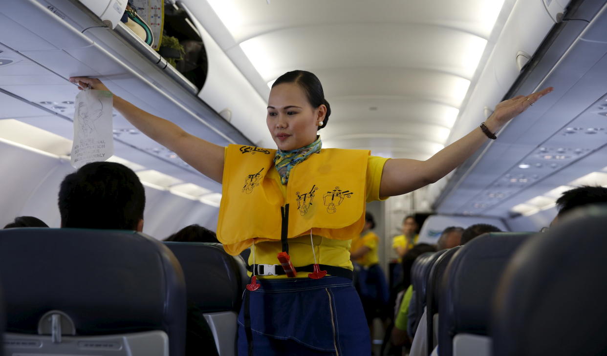 FILE PHOTO: A Cebu Pacific flight stewardess tells the passengers the location of oxygen masks in case of an emergency before take off at the Terminal 3 of the Ninoy Aquino International airport in Pasay city, Metro Manila Philippines April 1, 2016. REUTERS/Erik De Castro