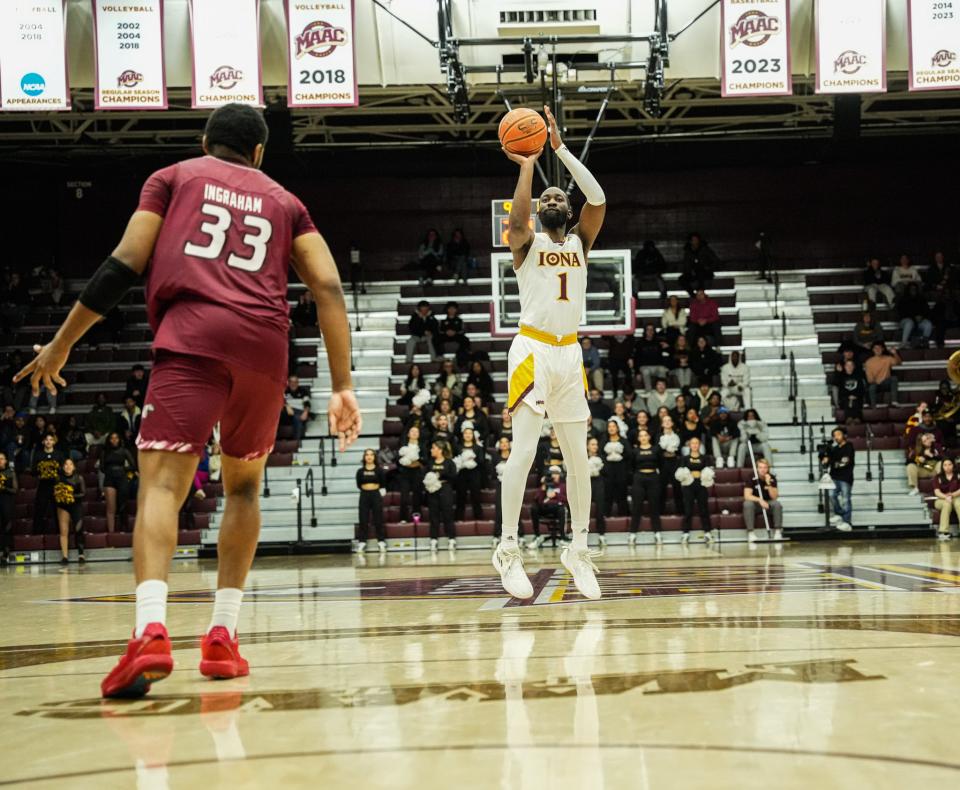 Iona's Wheza Panzo pulls up for a three-pointer during the Gaels' 94-93 win over Rider on Sunday, Feb. 4, 2024.