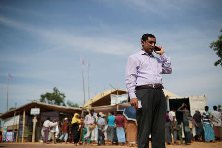 Mohib Ullah, a leader of Arakan Rohingya Society for Peace and Human Rights, talks on the phone in Kutupalong camp in Cox's Bazar, Bangladesh April 7, 2019. Picture taken April 7, 2019. REUTERS/Mohammad Ponir Hossain