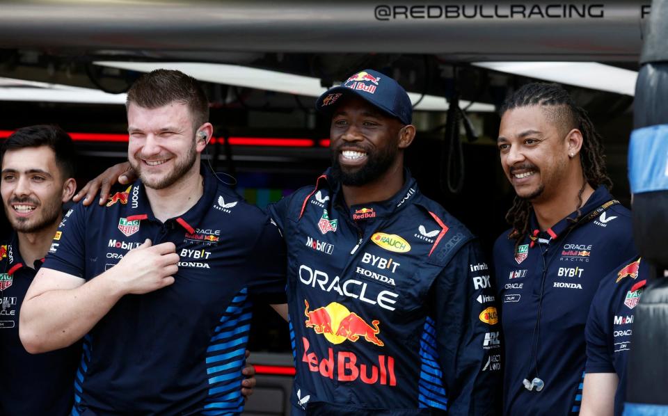 South Africa rugby captain Siya Kolisi posing for photos with the Red Bull crew