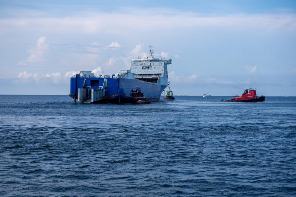 The Blue Origin ship Jacklyn is towed out to Pensacola Bay on Sunday.