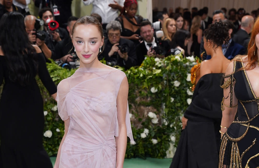 Phoebe Dynevor was pinching herself wearing a gown by Victoria Beckham credit:Bang Showbiz
