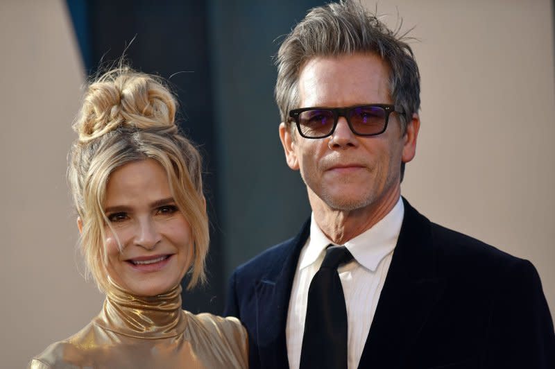Kevin Bacon (R) and Kyra Sedgwick attend the Vanity Fair Oscar party in 2022. File Photo by Chris Chew/UPI