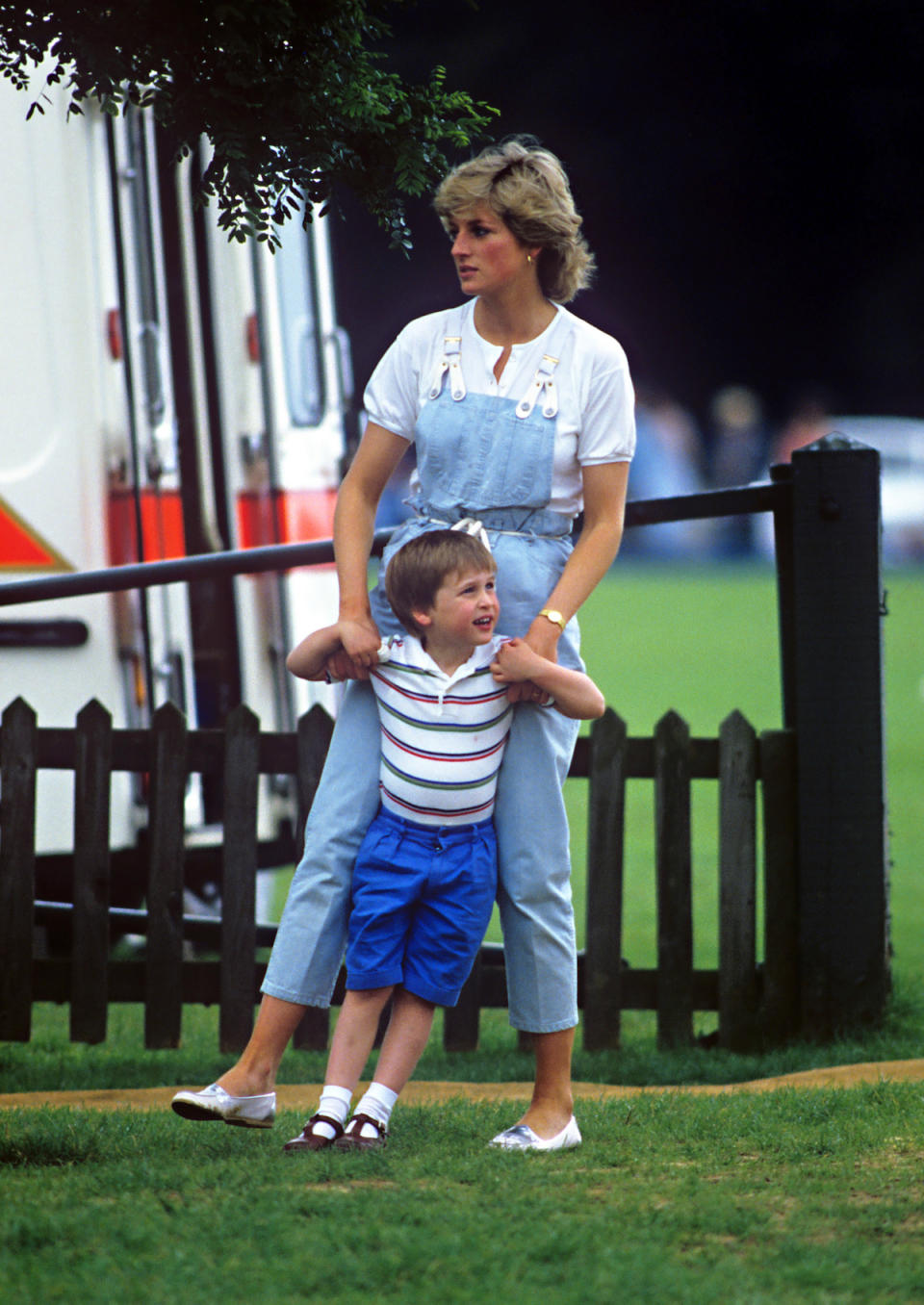 <p>Before Diana, royals were rarely seen wearing denim in public, let alone overalls. Her down-to-earth mom style endeared her to millions. (Photo: Julian Parker/UK Press via Getty Images) </p>