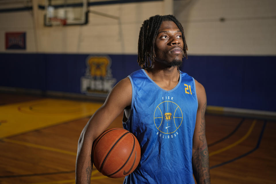 Fisk University basketball player Jeremiah Armstead poses for a portrait Wednesday, March 6, 2024, in Nashville, Tenn. The formerly homeless Armstead will receive the U.S. Basketball Writers Association 2024 Perry Wallace Most Courageous award at the NCAA Final Four basketball tournament. (AP Photo/George Walker IV)