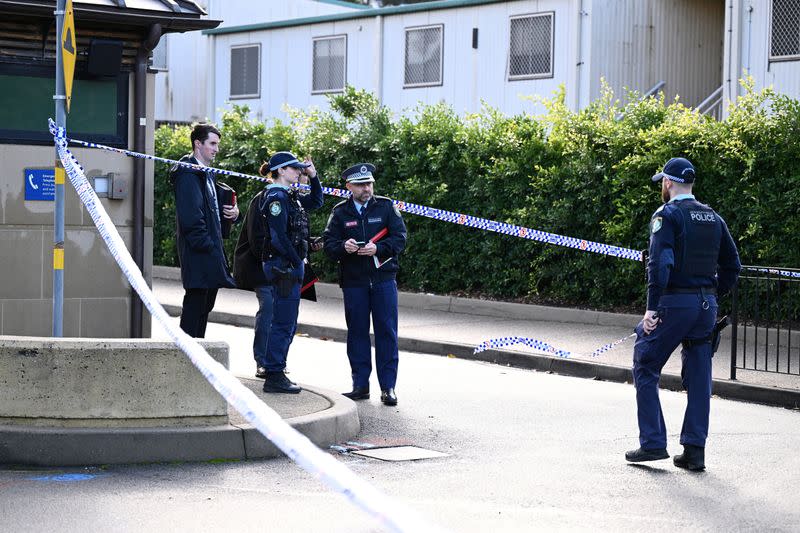 NSW Police work at the scene of an alleged stabbing at University of Sydney