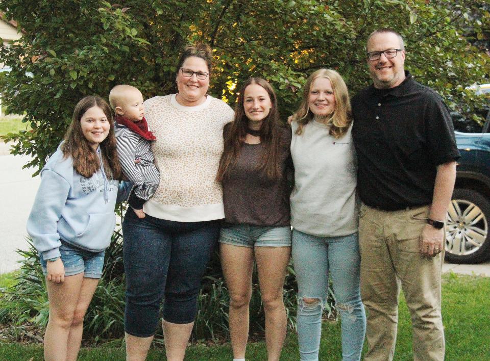 Foreign exchange student Julie Godart with her host family recently. From left, Lanie McGuckin, neighbor Mac Palmer with Shannon Fuhr, Julie Godart, Caitlin Fuhr and Kyle Fuhr.