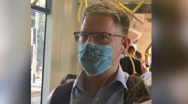 A man has outraged social media by wearing a face mask saying 