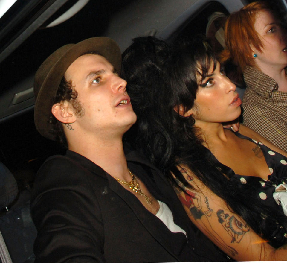 Amy Winehouse (right) and husband Blake Fielder-Civil (Photo by Sylvia Linares/FilmMagic)