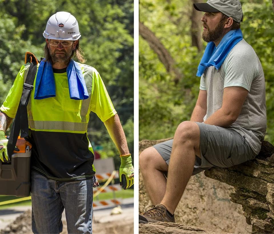 Two people wearing the cooling towel around their necks