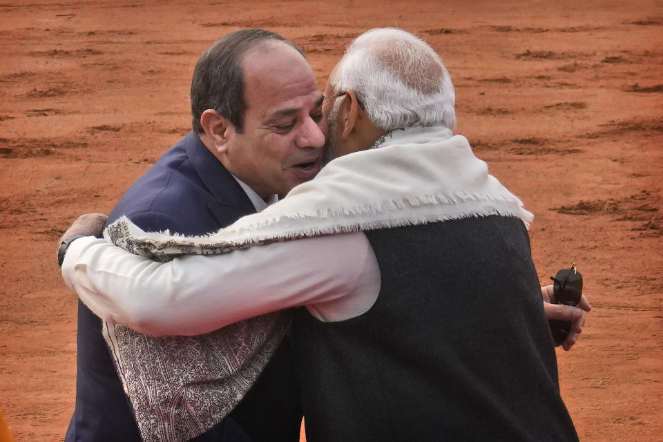 Indian Prime Minister Narendra Modi, right, hugs Egyptian President Abdel Fattah El-Sisi as the latter arrives for a ceremonial reception at the Indian presidential palace, in New Delhi, India, Wednesday, Jan. 25, 2023. El-Sisi will be the Chief Guest on the country's annual Republic Day parade on Thursday. (AP Photo/Manish Swarup)