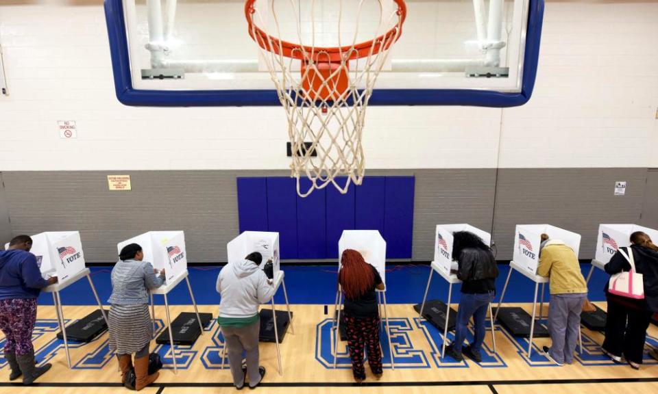 Citizens vote in the US general election in Greenville, North Carolina on 8 November 2016.