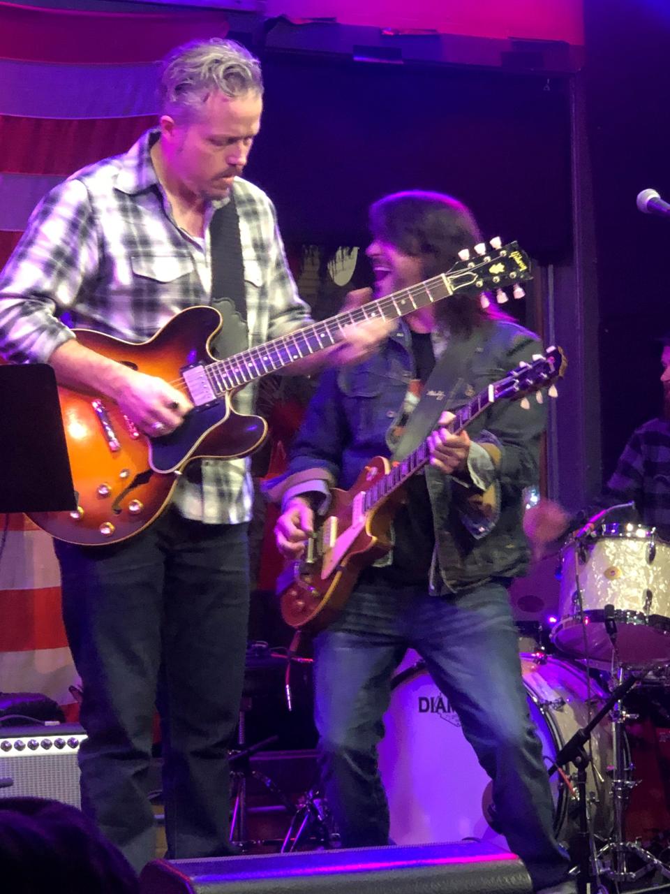 Jason Isbell is joined by fellow musician Gary Nichols during a pop-up show at Fox & Locke in Leiper's Fork on Dec. 23, 2022.