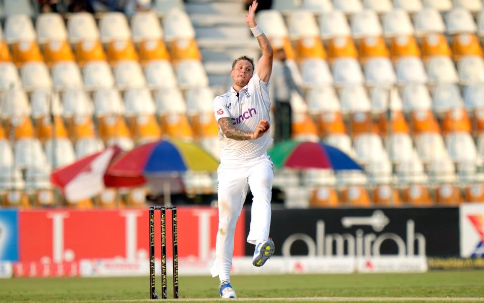 England's Brydon Carse bowls during the fourth day of the first test cricket match between Pakistan and England, in Multan, Pakistan, Thursday, Oct. 10, 2024