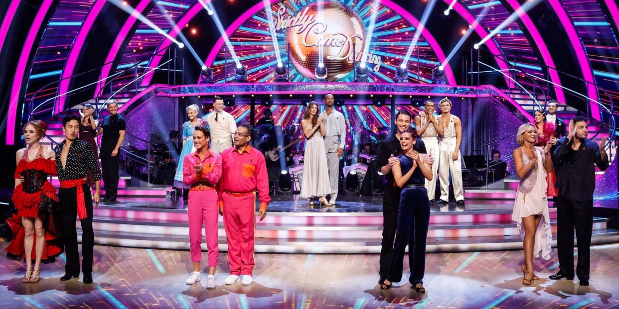 strictly come dancing 2023 week 7, the couples stand in front of the steps in their costumes