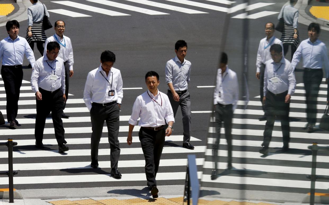 Office workers during lunch hour in Tokyo - REUTERS