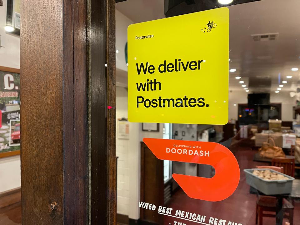 Food delivery sign outside El Gringo in Manhattan Beach, California