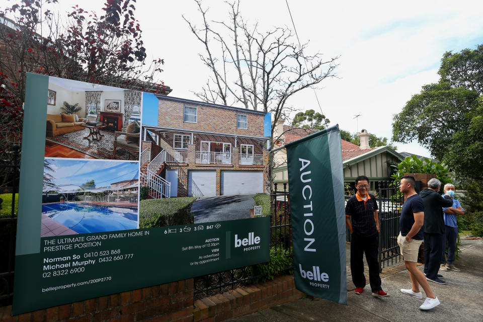 SYDNEY, AUSTRALIA - MAY 08: Prospective buyers attend an auction of a residential property in the suburb of Strathfield on May 08, 2021 in Sydney, Australia. Property prices continue to rise across Australia with house prices up almost 27 percent compared to five years ago. Record low interest rates have also seen a surge in home loan applications in the last year. (Photo by Lisa Maree Williams/Getty Images)