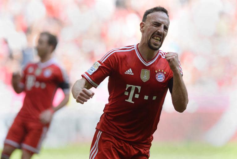 Bayern Munich's French midfielder Franck Ribery celebrates after scoring the first goal in the Bundesliga game against Werder Bremen at the stadium in Munich, southern Germany on April 26, 2014 DFL RULES TO LIMIT THE ONLINE USAGE DURING MATCH TIME TO 15 PICTURES PER MATCH. FOR FURTHER QUERIES PLEASE CONTACT DFL DIRECTLY AT + 49 69 650050