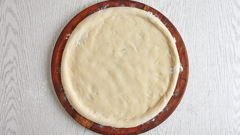 raw dough for a pizza 