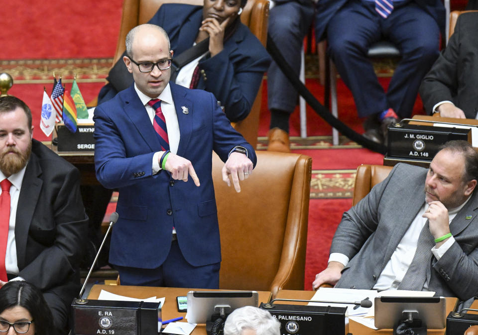 Assemblyman Edward P. Ra, R-Garden City debates legislation to approve a legislative pay raise during a special legislative session in the Assembly Chamber at the state Capitol Thursday, Dec. 22, 2022, in Albany, N.Y. (AP Photo/Hans Pennink)