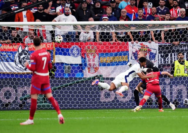 Jude Bellingham scores a goal for England