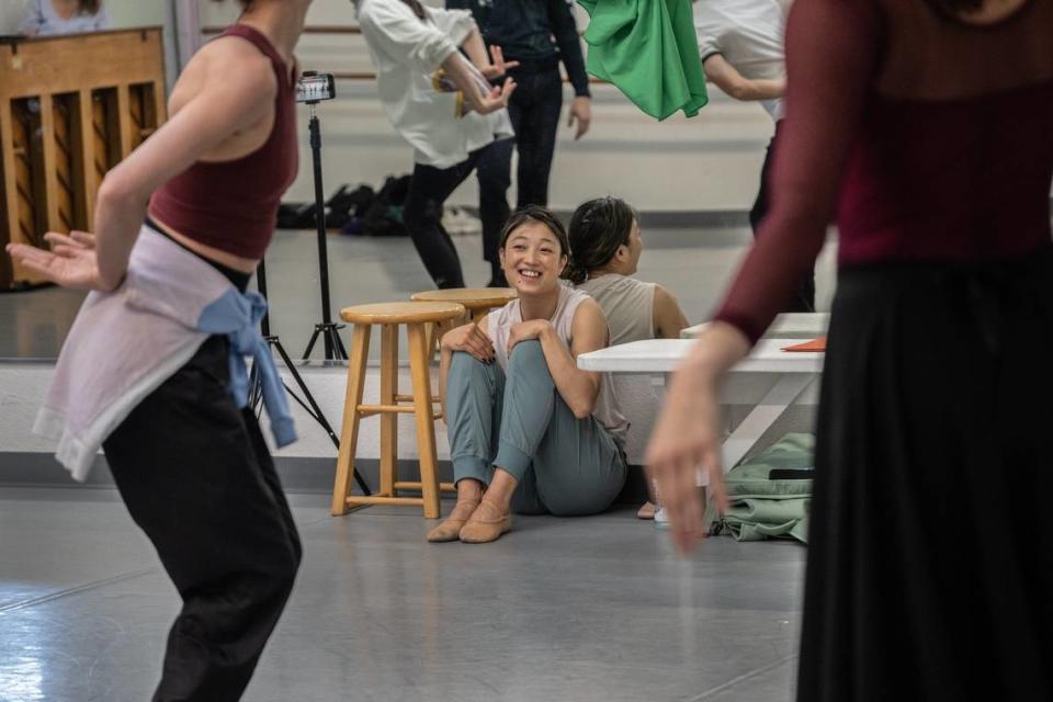 Sacramento Ballet dancer and choreographer Kaori Higashiyama watches ballet dancers perform during a dress rehearsal for a children’s ballet she choreographed called “Tanabata,” based on a Japanese fairytale she grew up with on Wednesday, June 21, 2023.