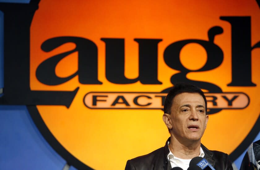 FILE - In this Nov. 20, 2006, file photo, Jamie Masada, owner of the venerable Hollywood nightclub The Laugh Factory, speaks at the club in West Hollywood, Calif. It was this summer and Israeli-Palestinian tensions were at the highest they'd been in some time when Masada hit on a formula for world peace: Forget about guns and bombs, and just tell jokes to each other. He knew it'd be a challenge to bring together people from across the world who dislike each other, and hope they will laugh at each other. And yet, that's what he's trying to do with what he calls the first Funniest Person in the World competition. (AP Photo/Matt Sayles, File)